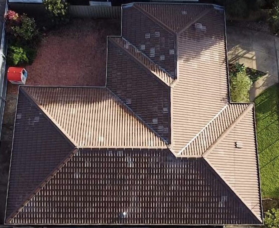 An arial photo of a home roof before roof restoration.